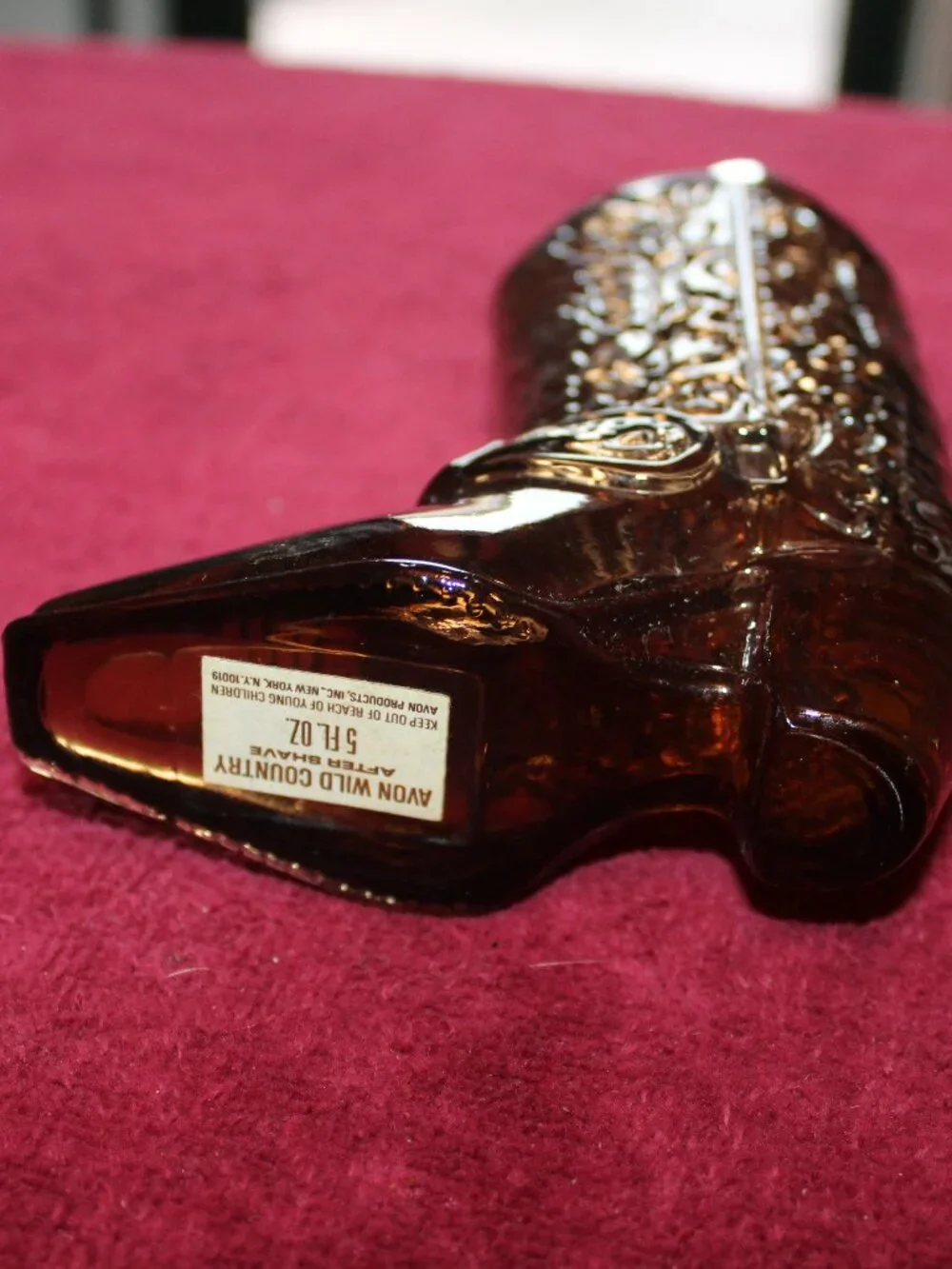Vintage Avon Western Boot decanter featuring amber glass